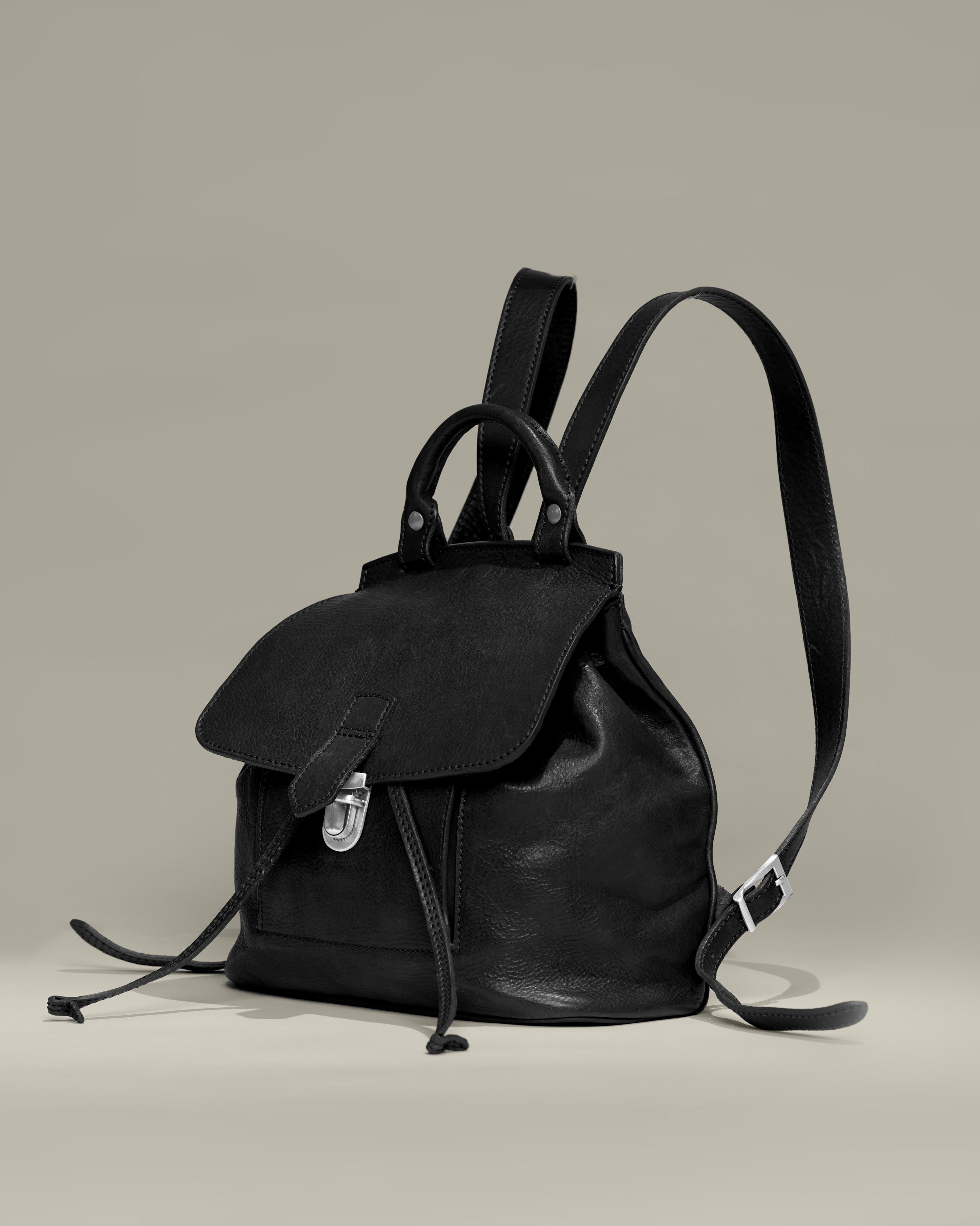 Cool Pleasures Drawstring Backpack Purse for Women Pampora Leather